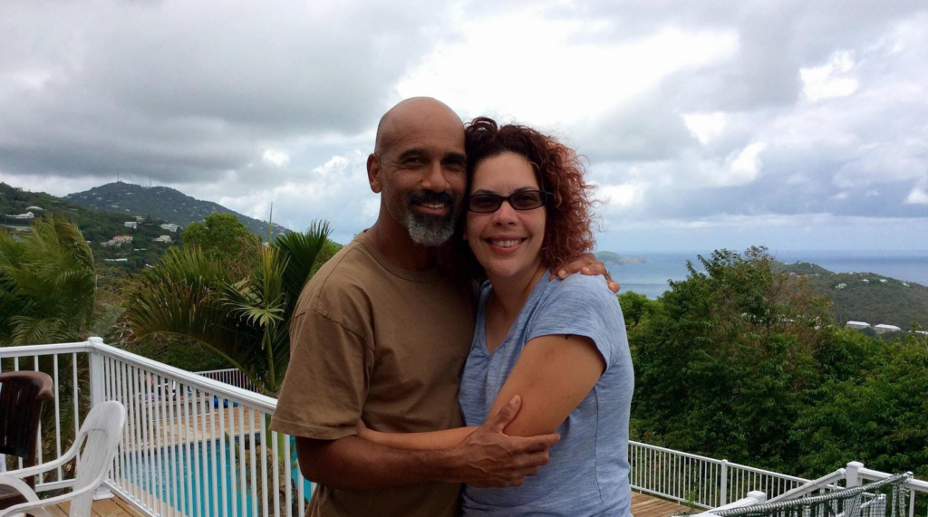 man and woman on vacation in a tropical island setting