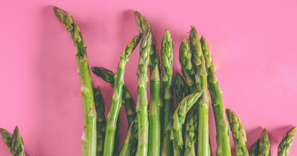 Picture of asparagus on a pink background