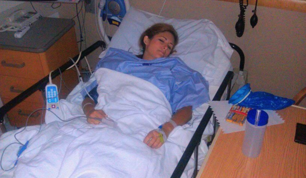 Picture of Kelli Roseta in the hospital during a lupus flare up. 